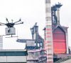 Drohne Deliv AIRy fliegt über das Werksgelände von Thyssenkrupp