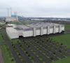 Das stillgelegte Kohlekraftwerk im saarländischen Ensdorf mit einer Animation der geplanten 200-Millimeter-Siliziumkarbid-Halbleiterfabrik von Wolfspeed und ZF.