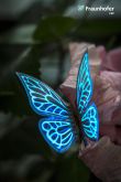 Bild 5: Schmetterlings-Modul im Naturalis-Stil mit leuchtender Gitterstruktur.